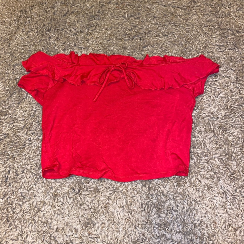 Off the shoulder red ruffle shirt